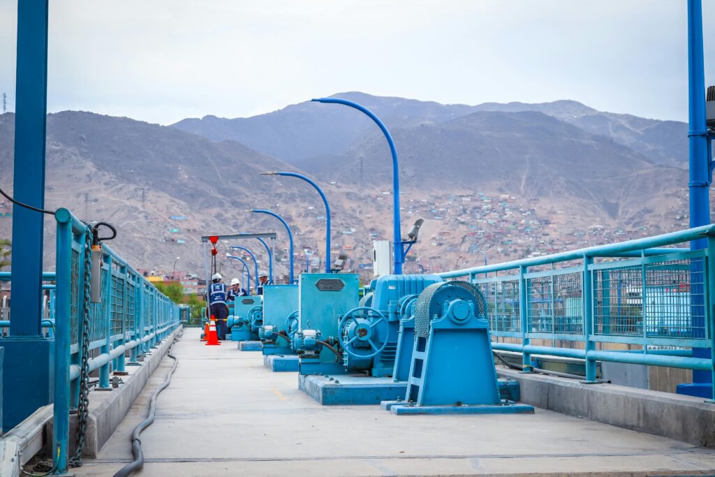 pexels photo 32529350 32529350 View of an industrial walkway with machinery in El Agustino, Lima, Peru.